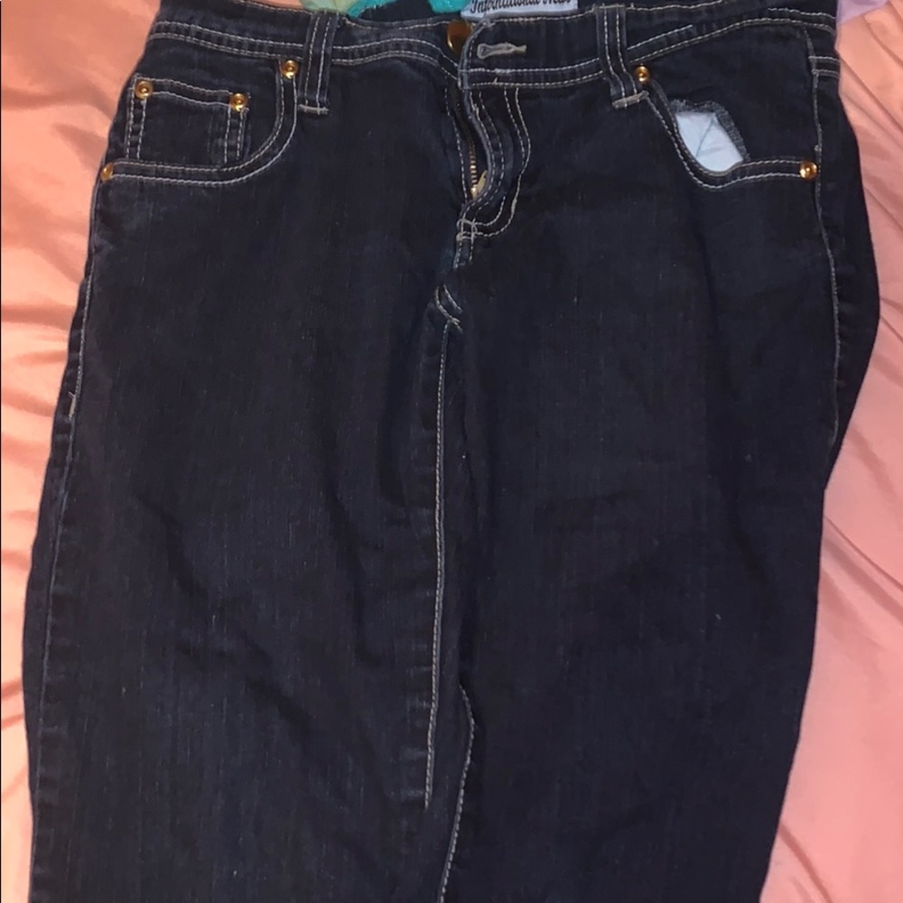 Dark high waisted jeans.